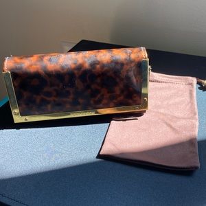 Tory Burch sunglasses case and pouch